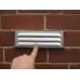 BRICK VENT 230 X 75 ZINCALUME STEEL WITH EMBER MESH, FOLDED, SIDE TABS 